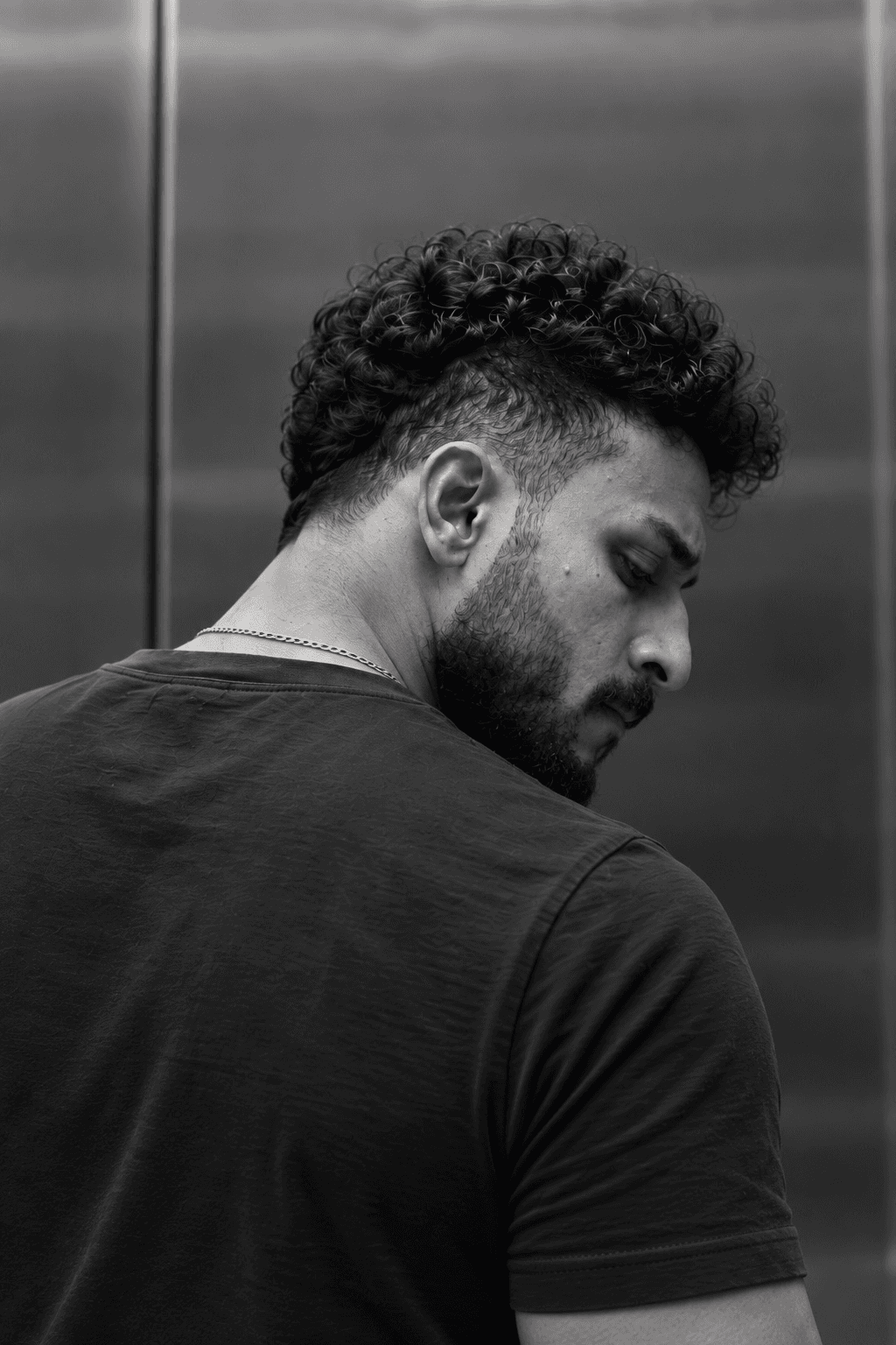 Black and white portrait of Sharan Kuniyil Shaji
